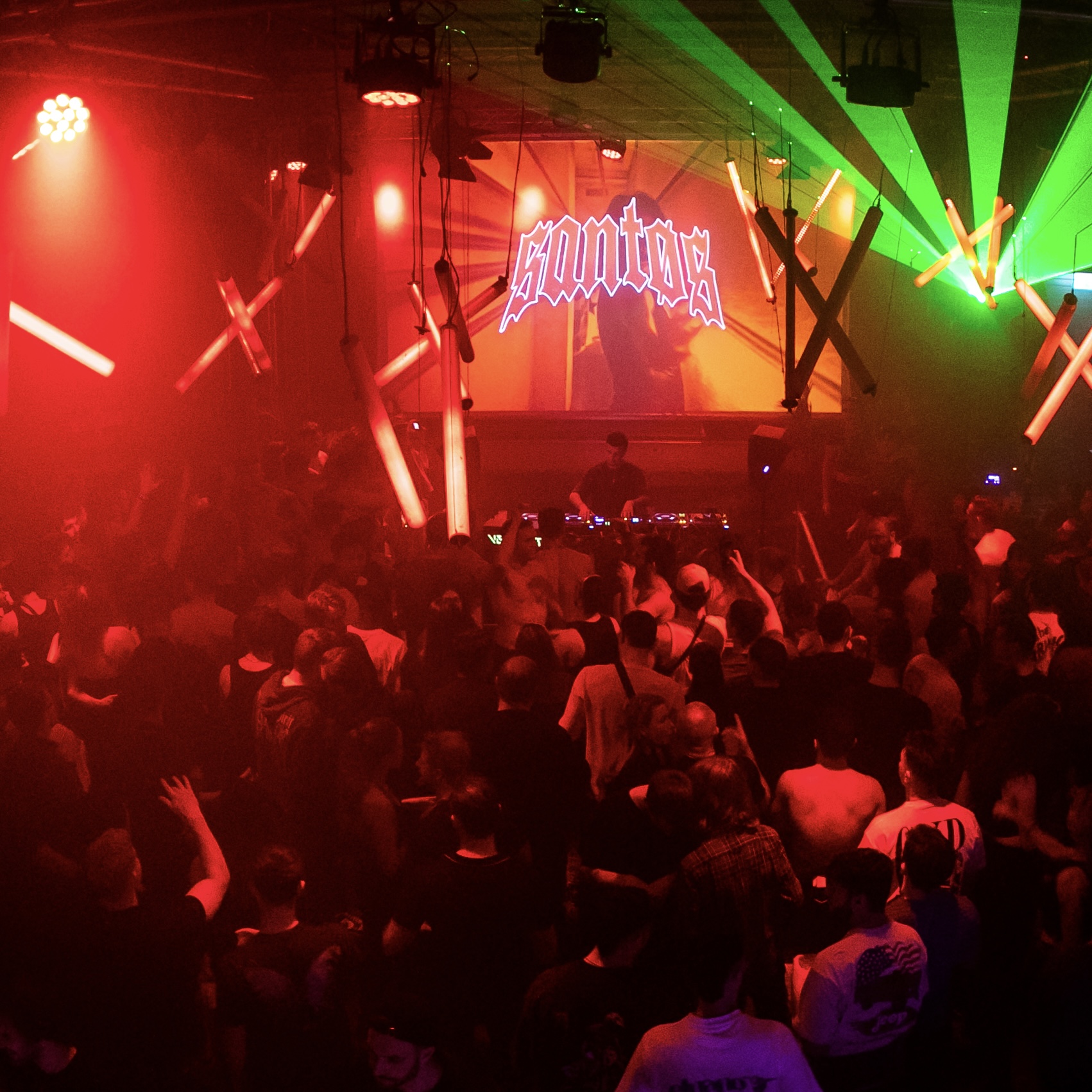DJ booth with red lighting at Toekomstmuziek